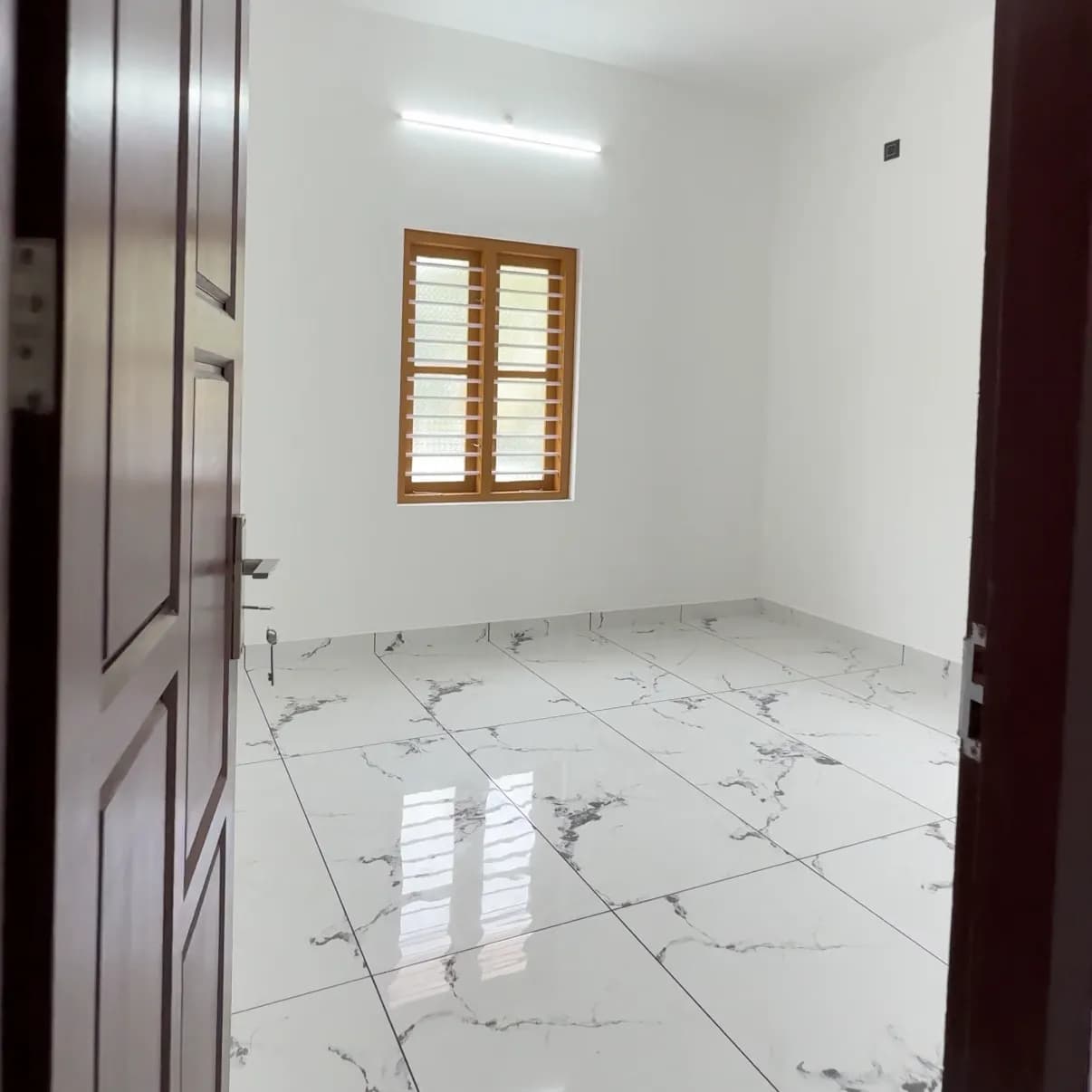 5.5 Cents 3BHK house near Mammoodu Junction, Kollam
